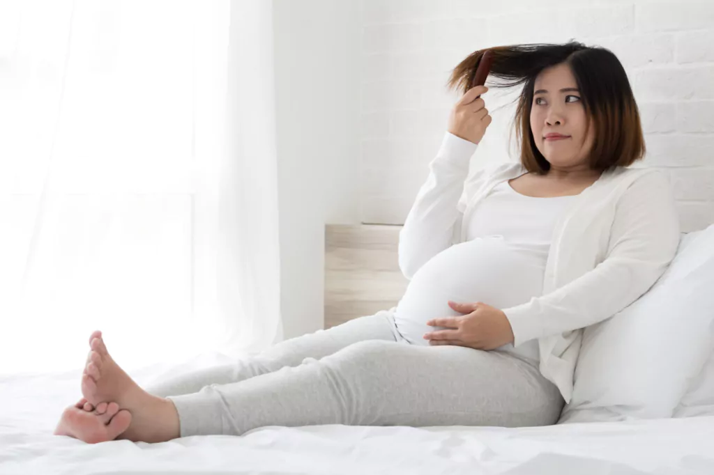 Hair Loss in Pregnancy: Why It Happens & What to Do About It 11 Hair Loss in Pregnancy: Why It Happens & What to Do About It 11